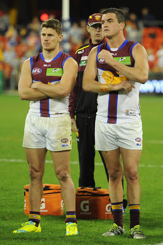 AFL 2016 Rd 16 - Gold Coast v Brisbane GOLD COAST, AUSTRALIA - JULY 09: Dayne Zorko and Tom Rockliff of the Lions looks dejected during the 2016 AFL Round 16 match between the Gold Coast Suns and the Brisbane Lions at Metricon Stadium on July 9, 2016 in Gold Coast, Australia. (Photo by Matt Roberts/AFL Media)